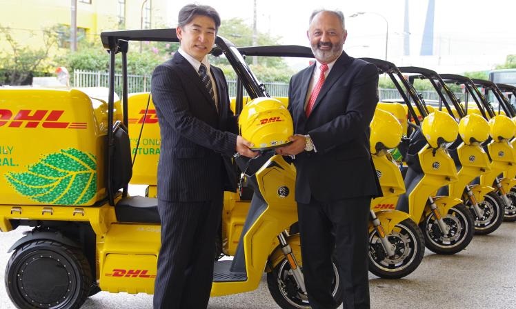 DHL's Tony Khan with Japanese motorcycles