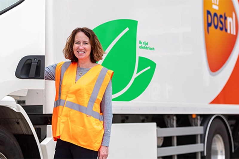 PostNL CEO Herna Verhagen with an electric truck