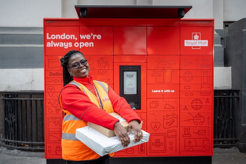 Postwoman Angelina Kane at Royal Mail's first own parcel locker in London